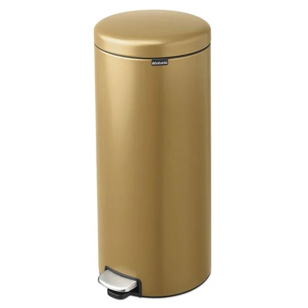 a gold trash can with a pedal
