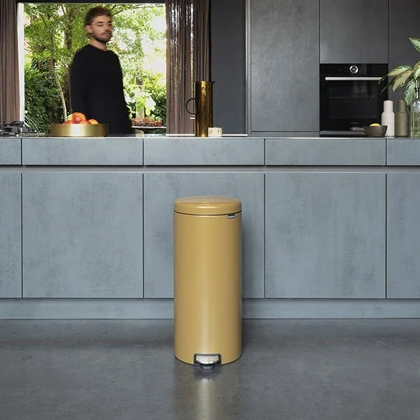 a man standing in a kitchen